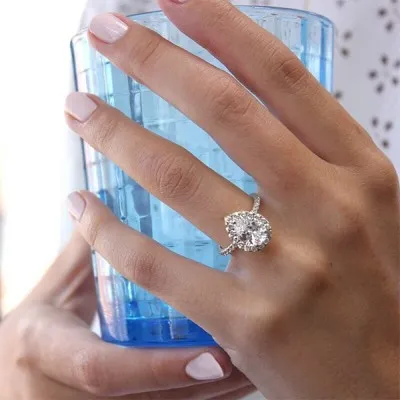 Platinum Halo Pear Shaped Engagement Ring jewelry windy city