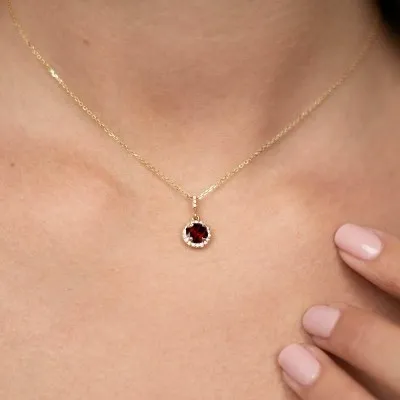 Yellow Gold Ruby Gemstone and Diamond Halo Pendant Necklace jewelry store near me