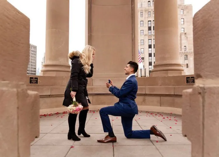 man proposes his girlfriend with a diamond engagement ring bought from best custom jewelers in chicago
