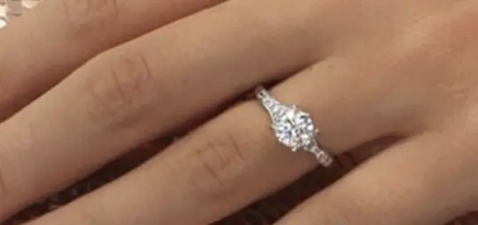 Round-Cut Engagement Ring - Indulge in its Sparkle