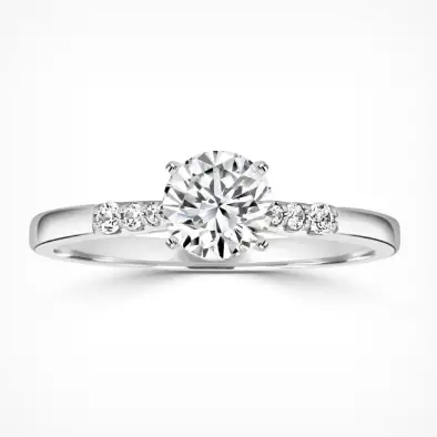 delicate and elegant side stone diamond ring