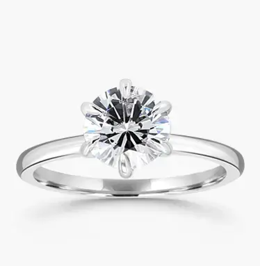 Classic and elegant solitaire engagement ring with round diamond in platinum